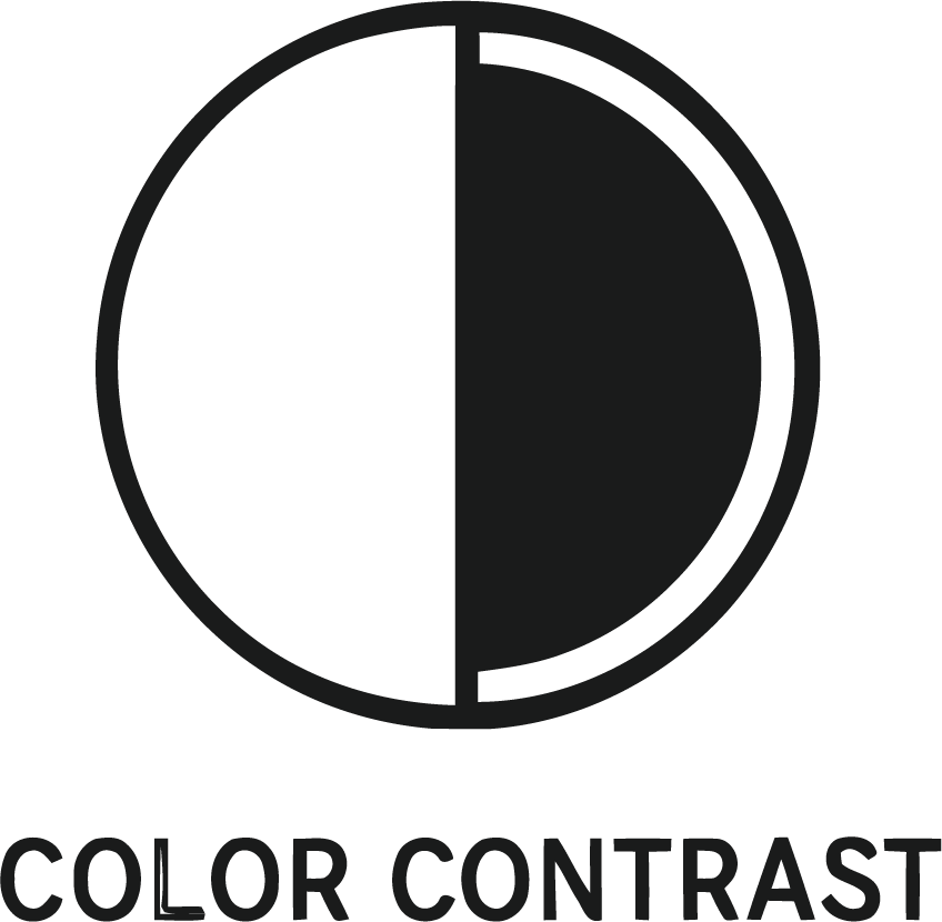 A circle split in half. Half is empty, and half has been filled in black but leaves a white line around it. This icon is meant to represent color contrast.